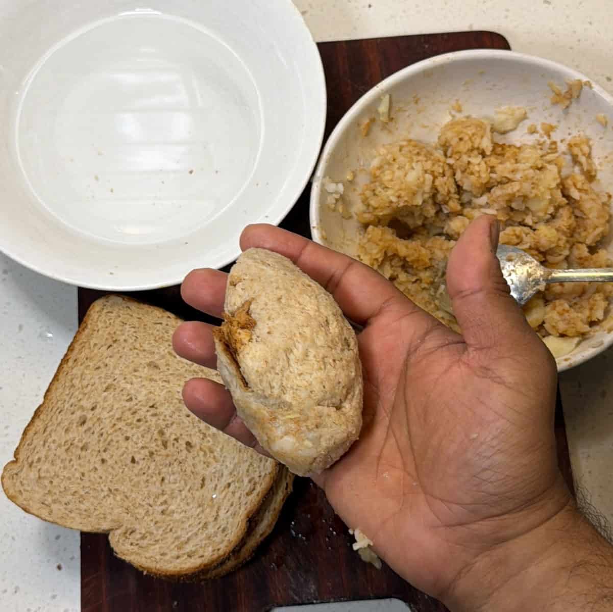Shaped stuffed bread roll made with bread and potato filling