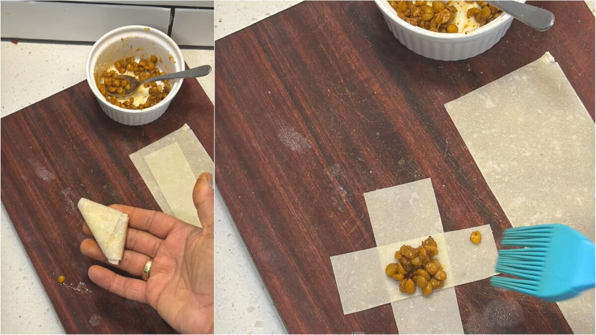 Samosa patti with chana dal filling and a hand folding a mini samosa.