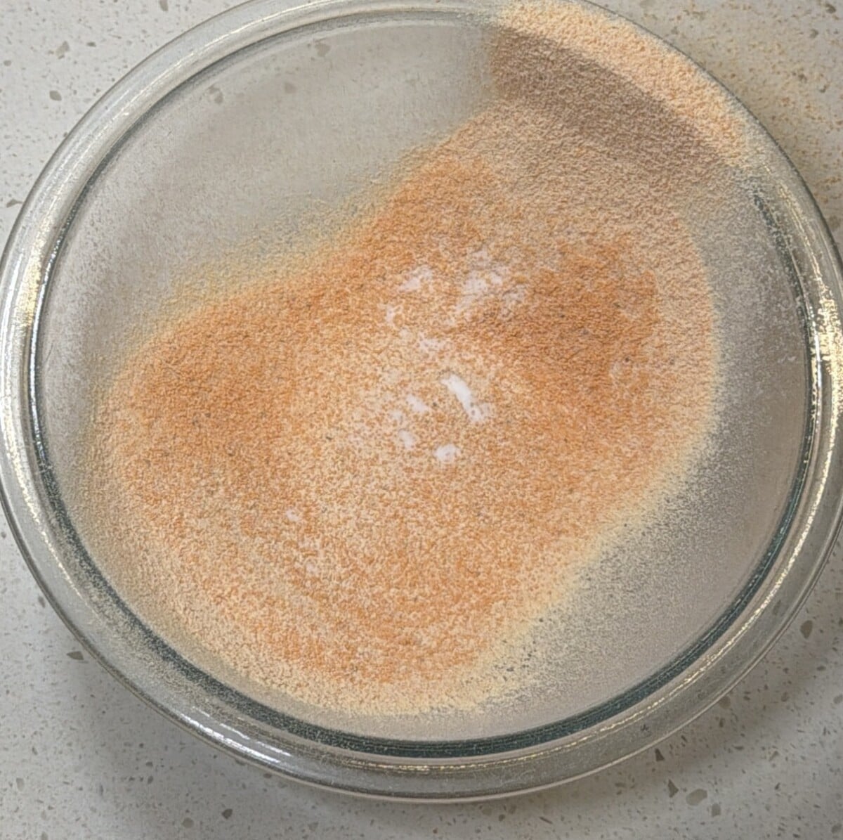 Mix lentil flour, water, salt, chaat masala, amchur powder and baking soda in a bowl,