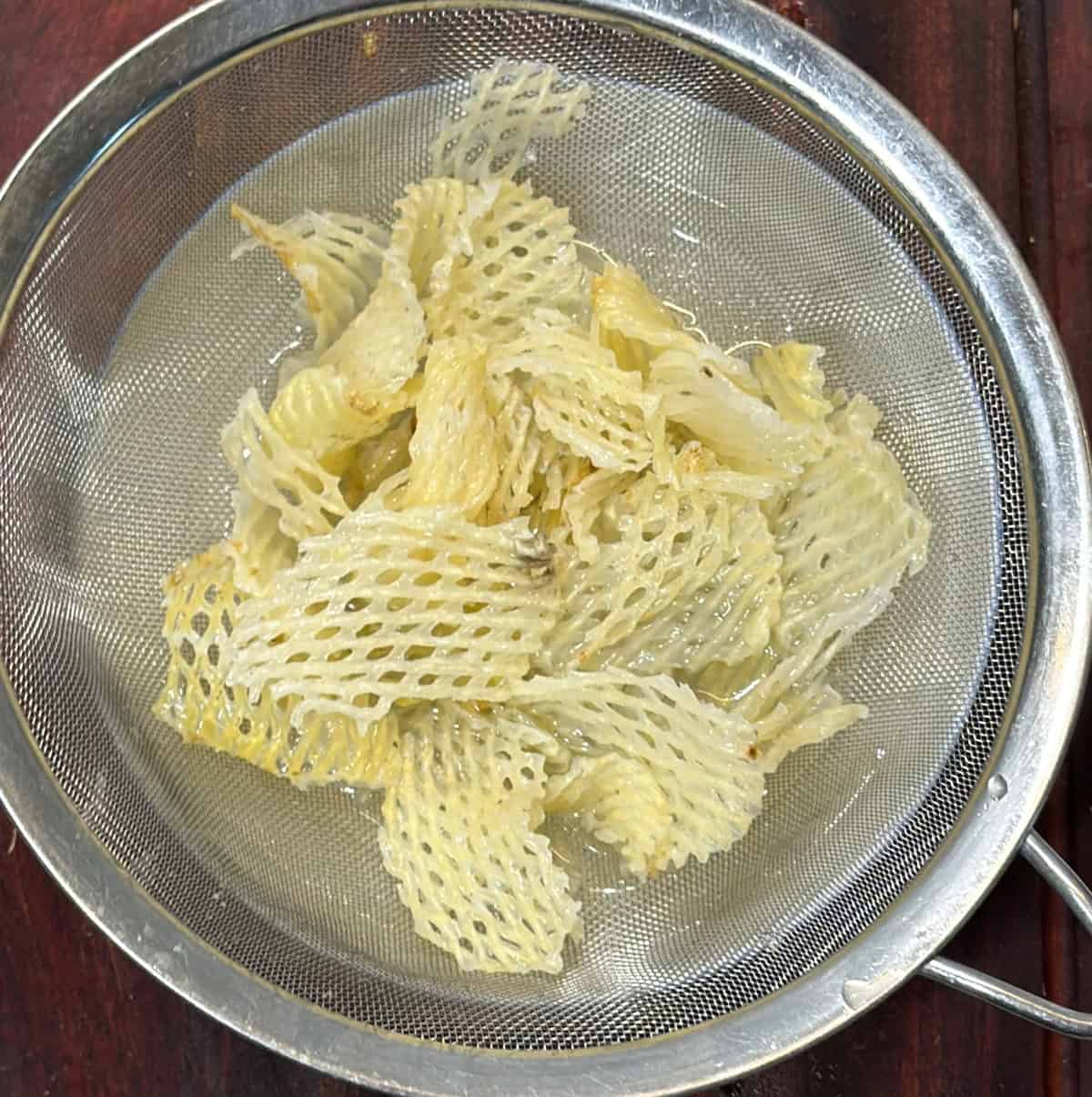 Strained potato chips sprayed with oil for air fryer dry fruit chivda