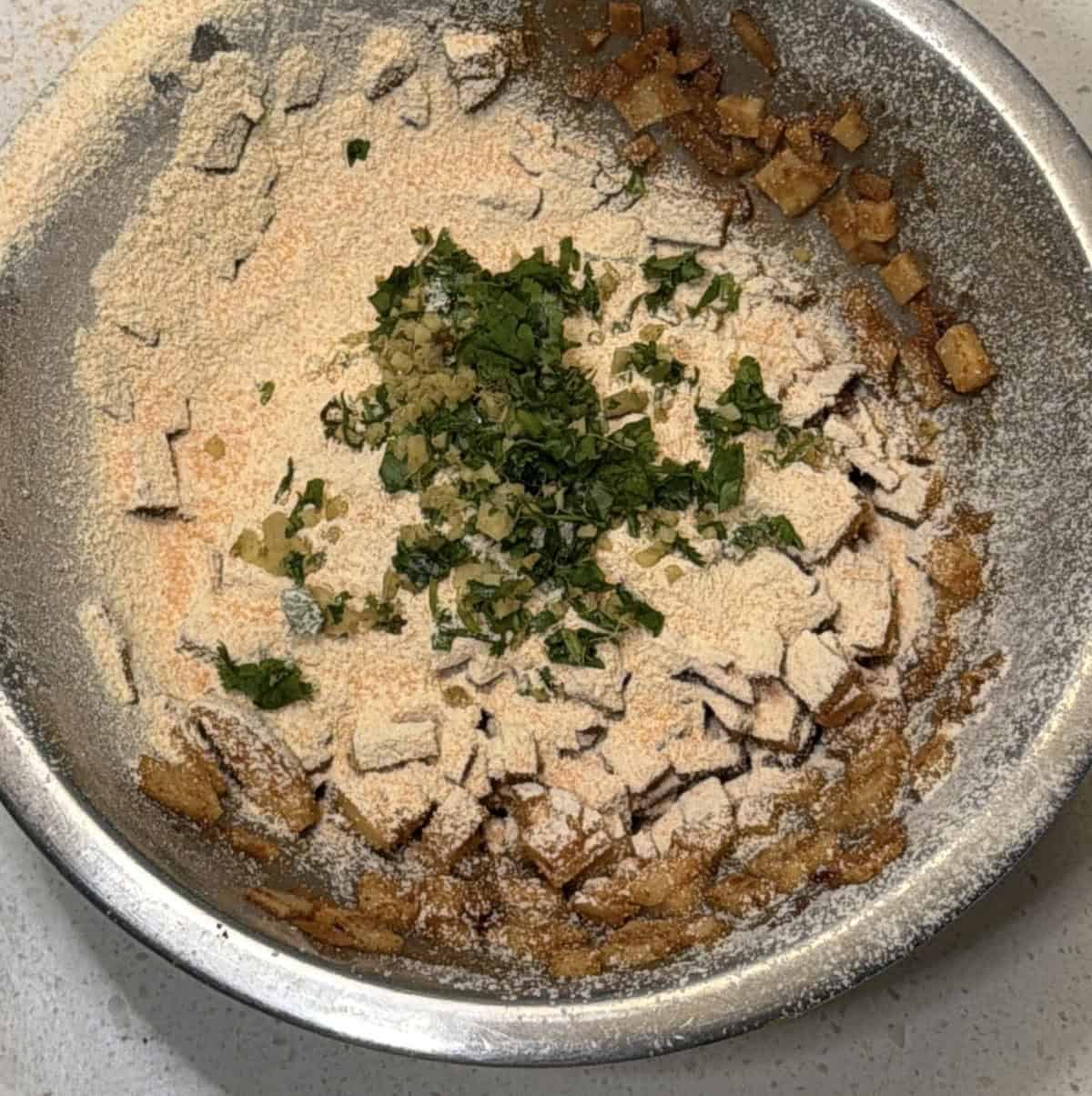 Lentil flour and gram flour added to potato onion pakora mixture