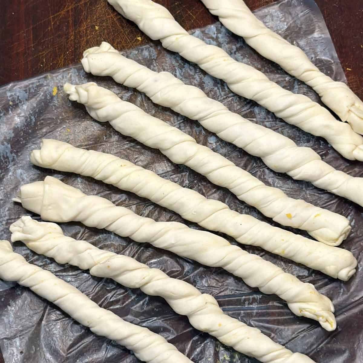 Rolled puff pastry shaped into twists before air frying