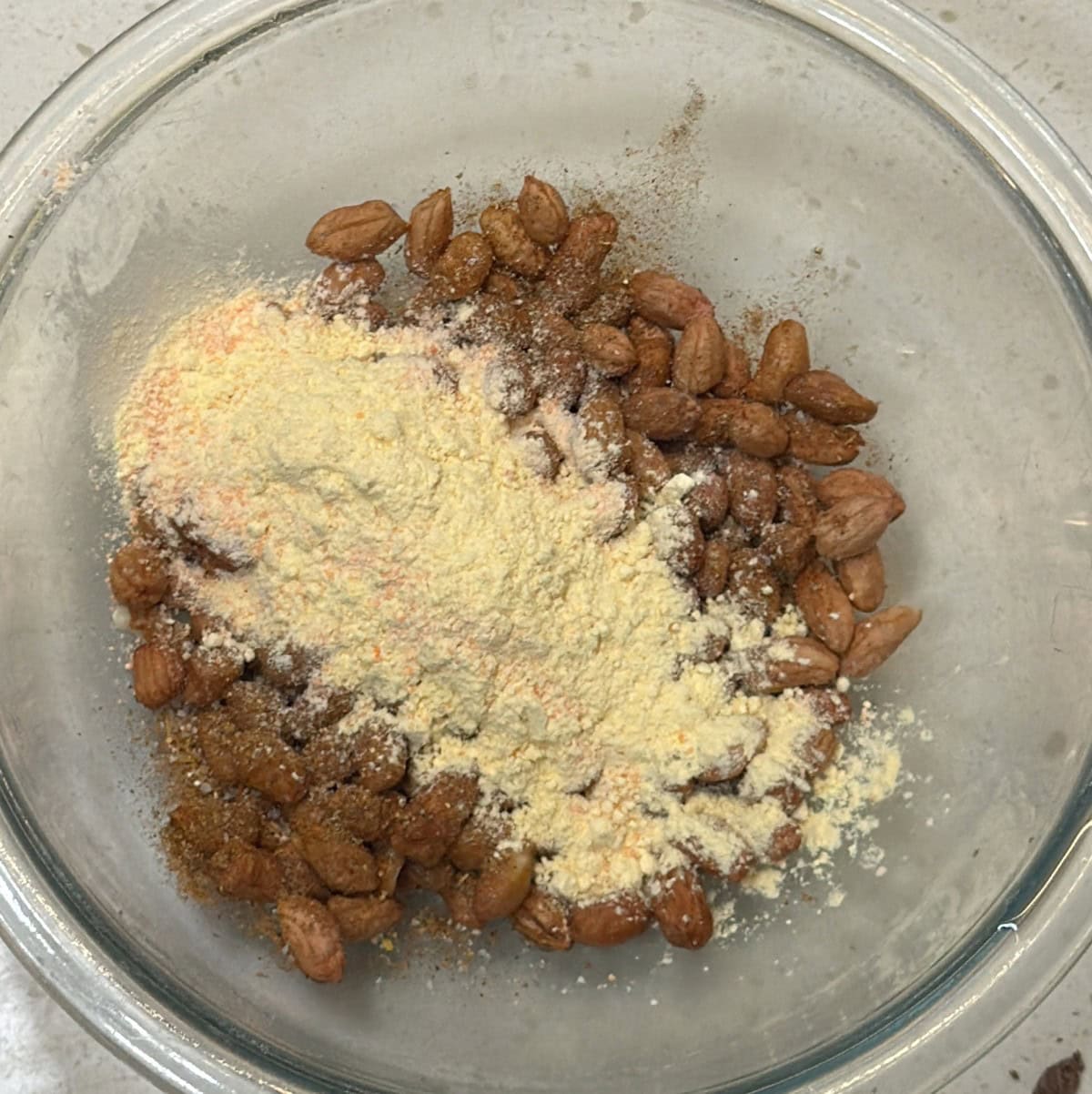 Peanuts with red lentil flour and spices for masala peanut coating