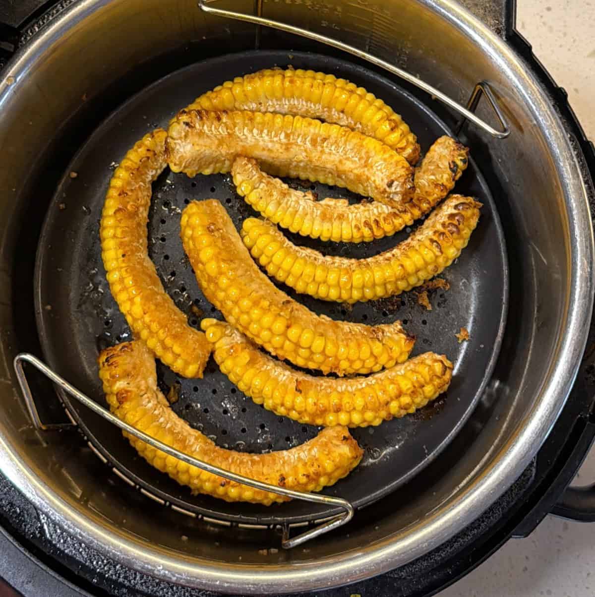 Cooked air fryer corn ribs with browned edges