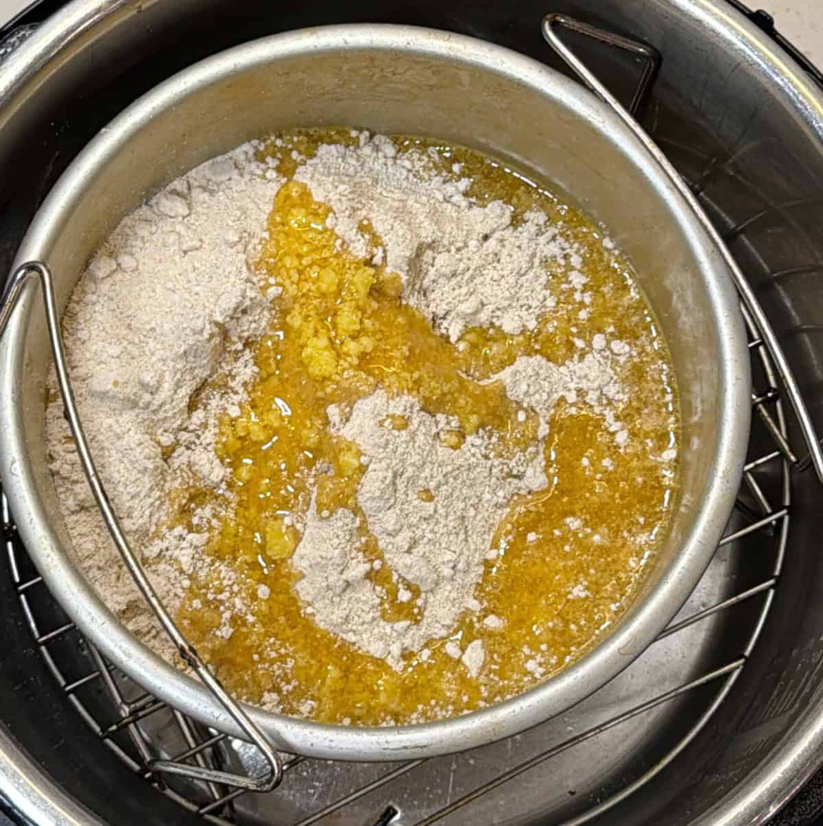 ground oats mixed with ghee for air fryer oats ladoo
