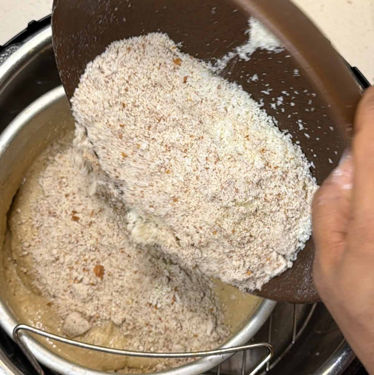 almond flour and coconut added to roasted oats for air fryer ladoo