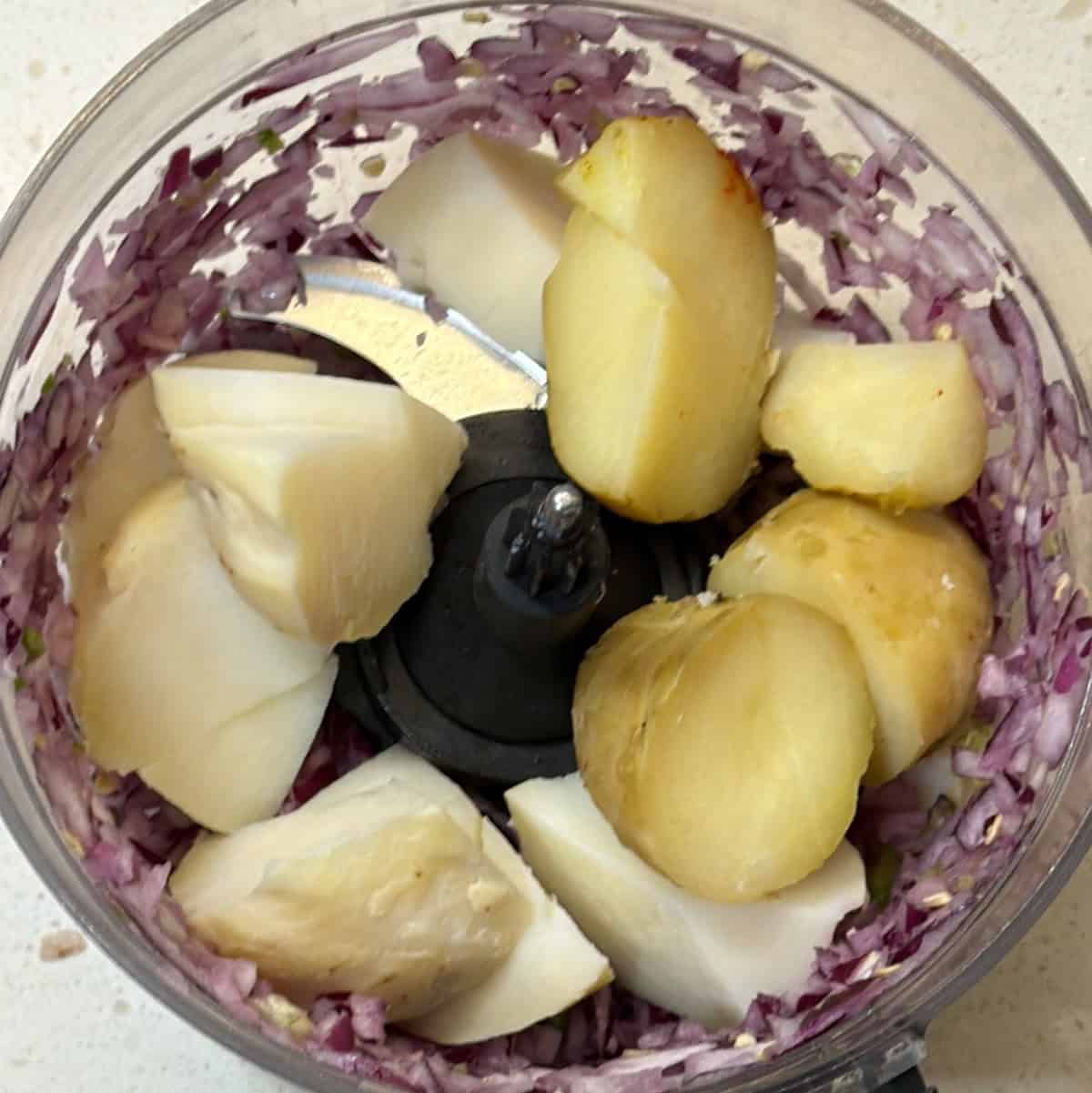 Boiled potatoes added to chopped onion mixture for poha cutlet
