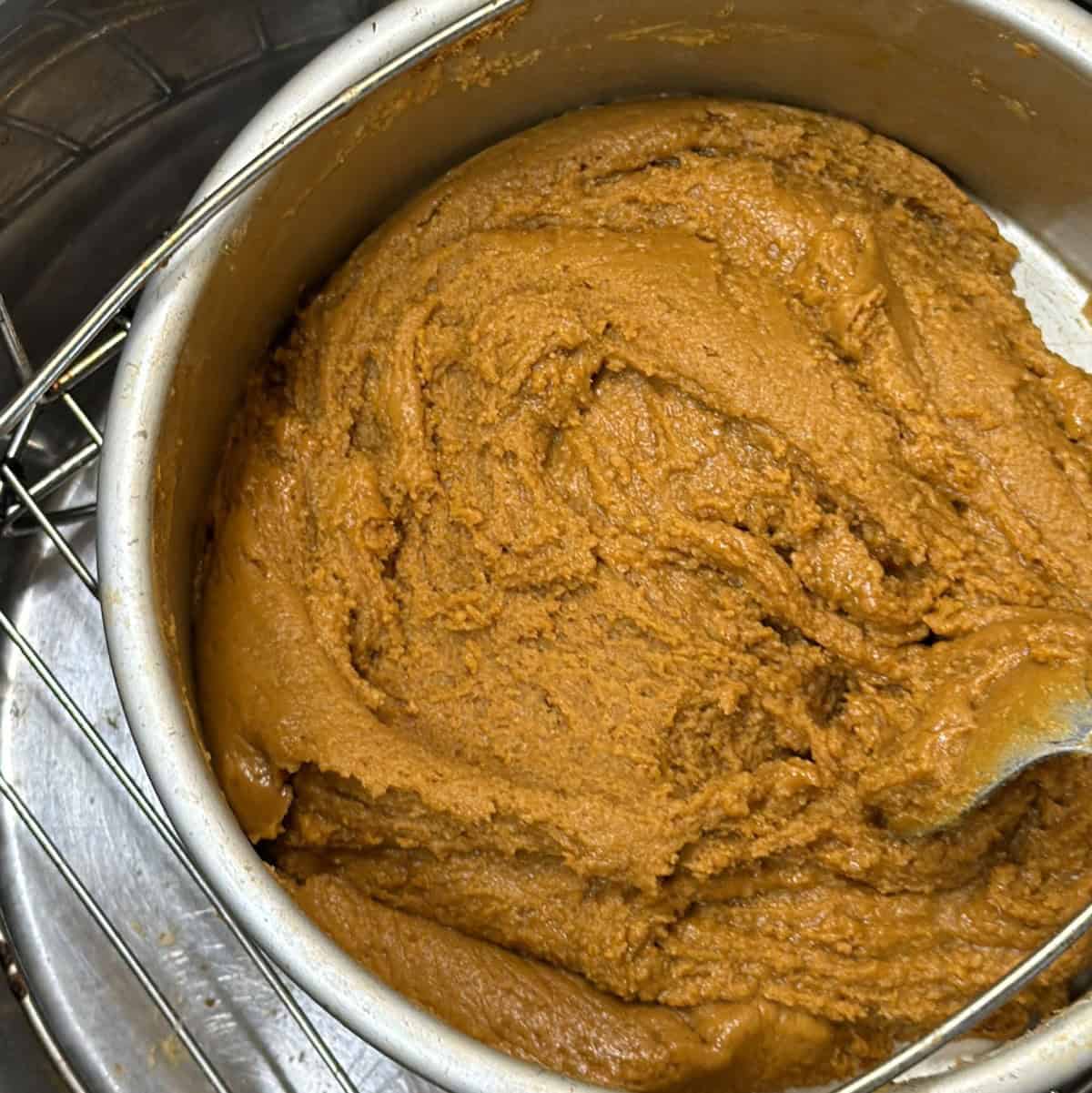 Smooth sattu burfi mixture ready to set after adding sugar and cardamom