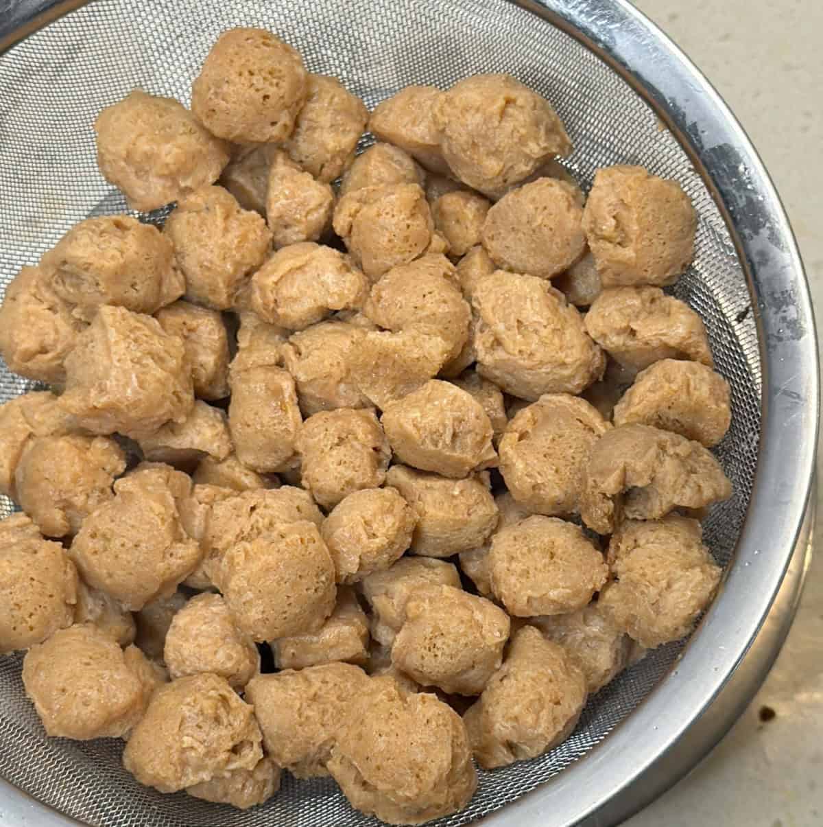 Soaked soy chunks drained before making air fryer vegan popcorn chicken