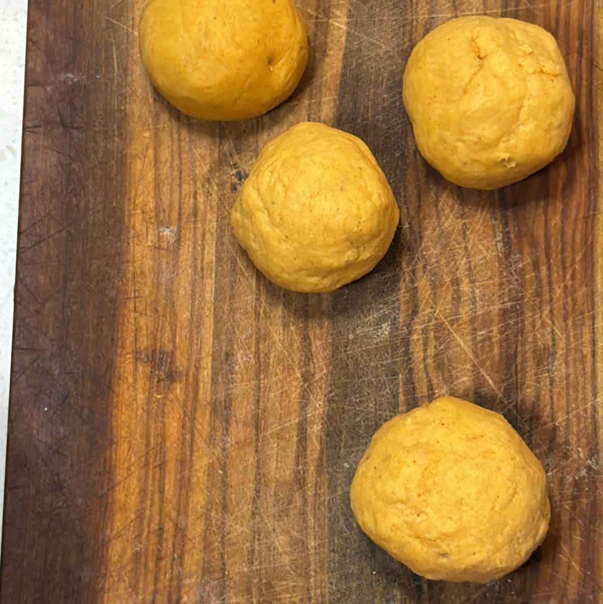 Small portions of fafda dough shaped into balls