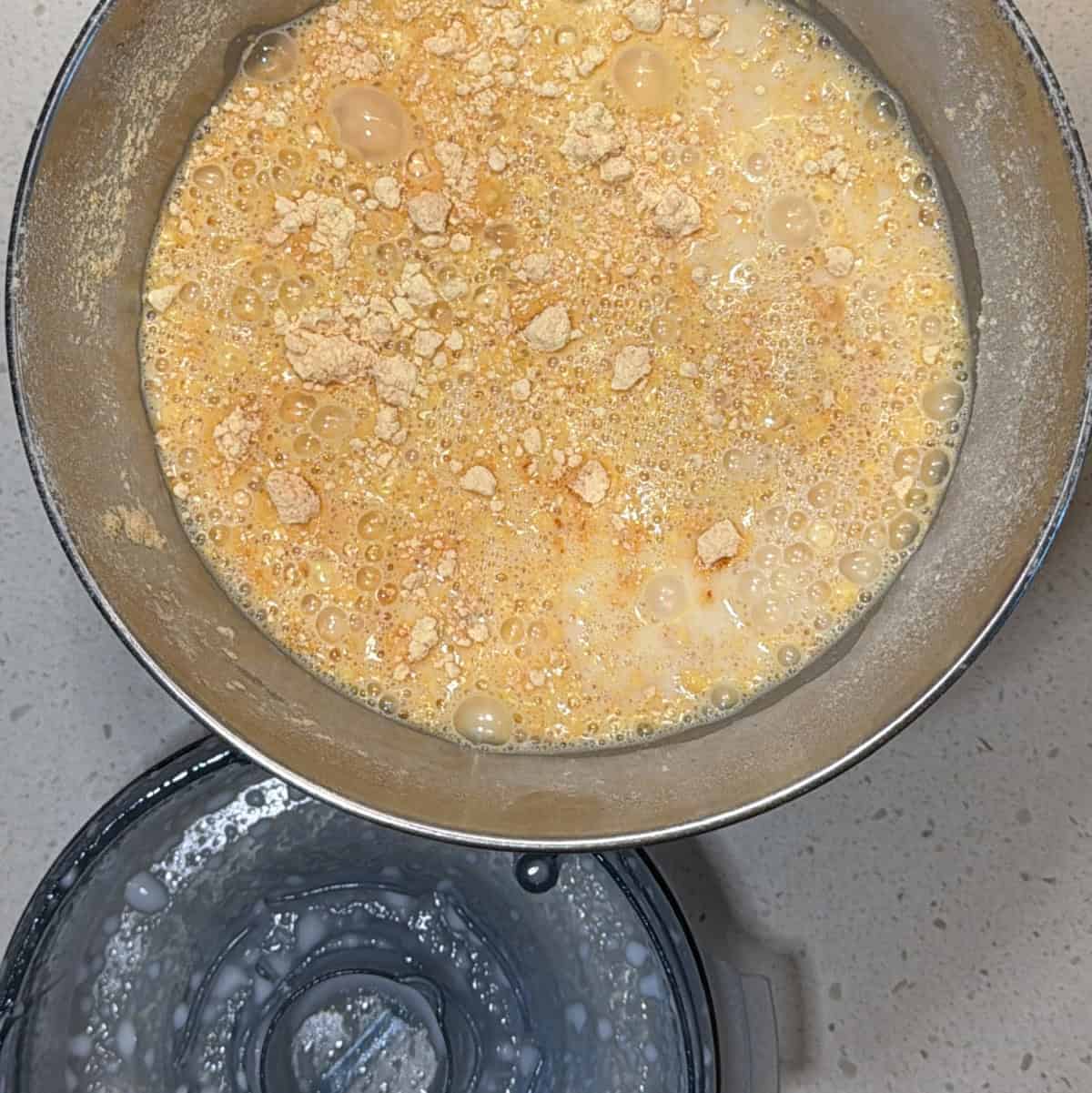 Water and oil in blender jug for fafda dough