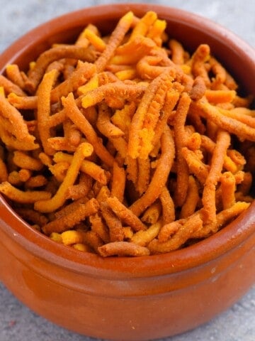 Crispy golden air fryer tikha gathiya made with thick Gujarati namkeen strands
