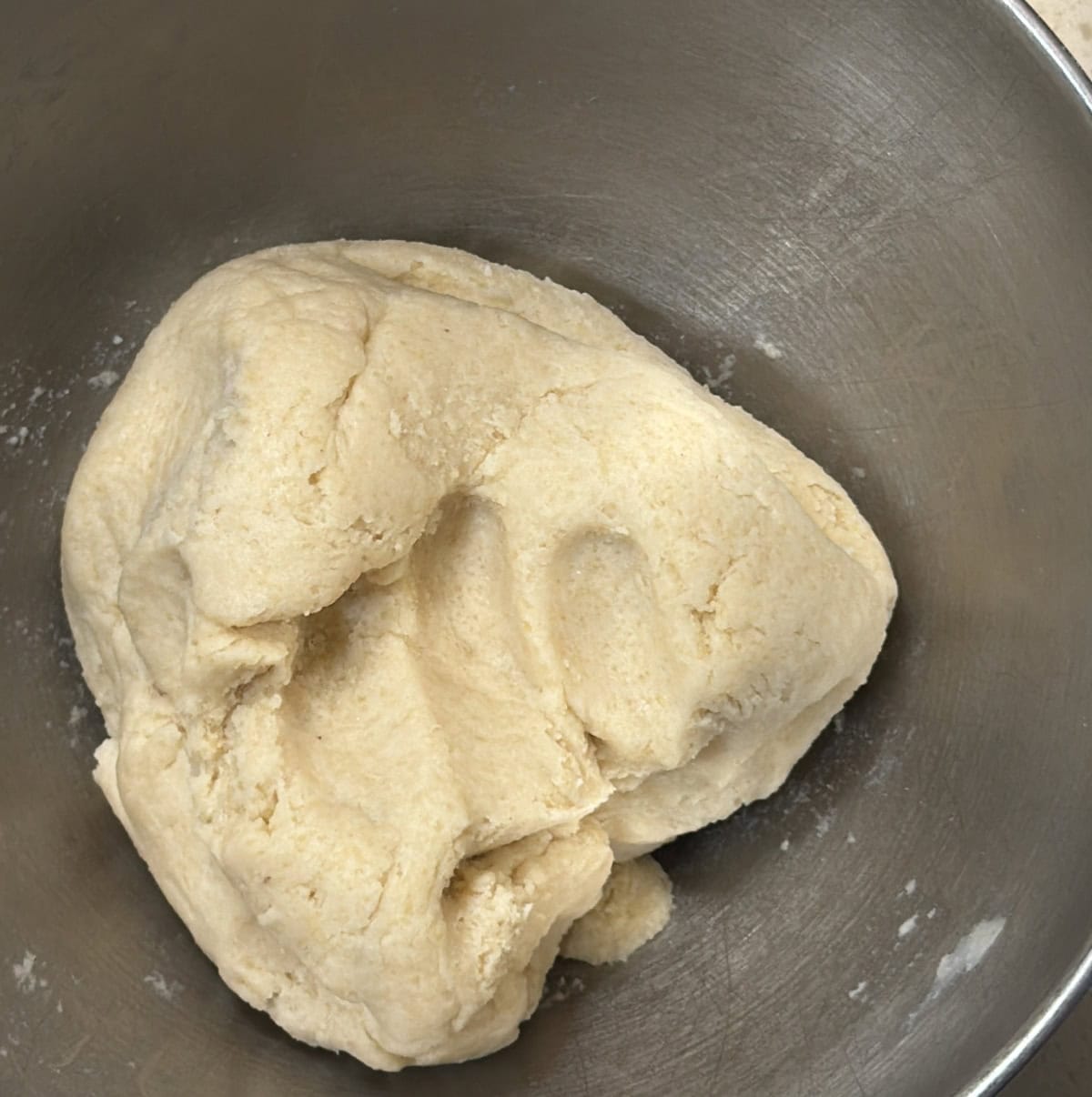 Firm seedai dough kneaded in a mixing bowl