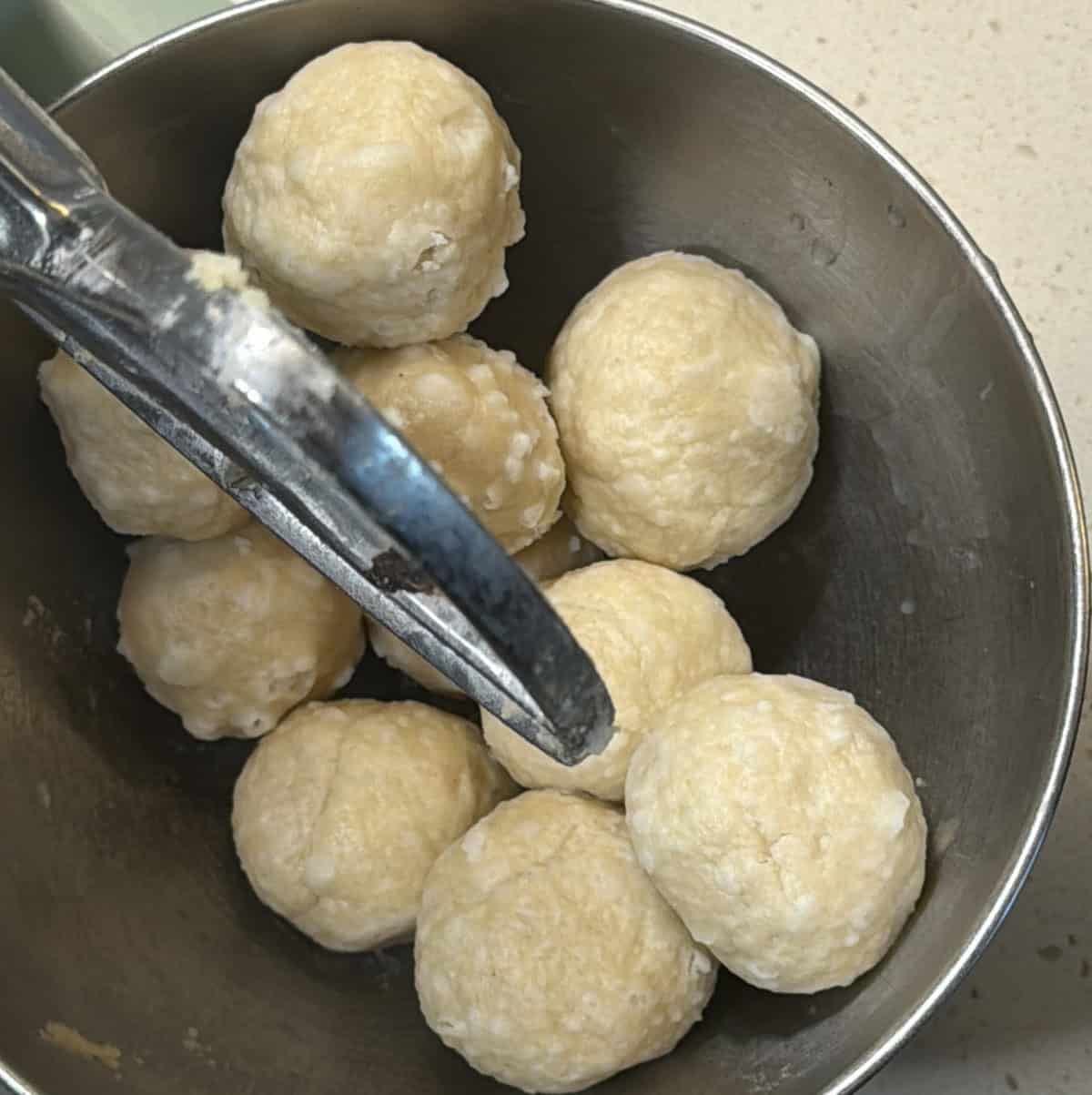 Large dough balls prepared before boiling