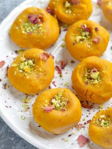 Homemade sugar-free mango peda made with milk powder and monk fruit sweetener